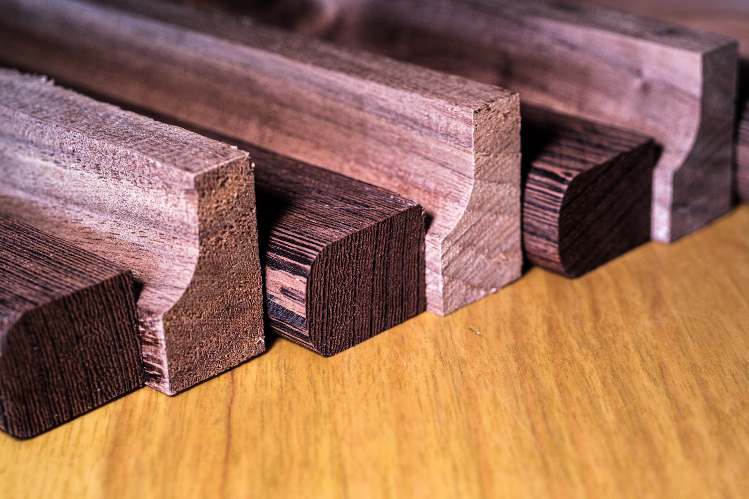 Walnut and maple hardwood milled for framing